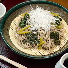 Buckwheat noodles served on a bamboo strainer