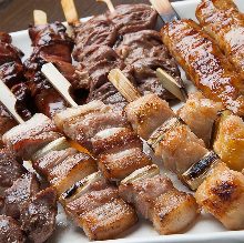 Assorted grilled chicken skewers