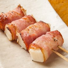 Grilled wiener sausage and bacon skewer