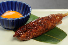 Meatballs served with egg yolk