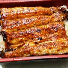 Extra premium eel served over rice in a lacquered box