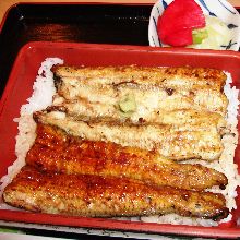 Extra premium eel served over rice in a lacquered box