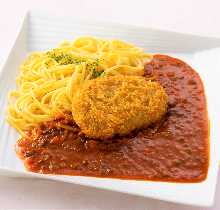 Pasta with meat sauce, topped with pork cutlet