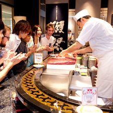 All-you-can-eat sushi and tuna filleting show