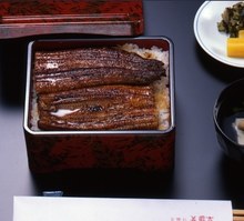 Eel served over rice in a lacquered box