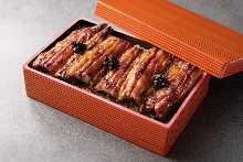 Premium eel served over rice in a lacquered box