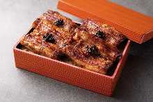 Extra premium eel served over rice in a lacquered box