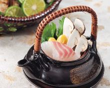 Matsutake steamed in an earthenware teapot