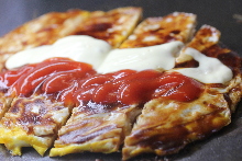 Tonpei-yaki (stir-fried cabbage and meat topped with egg)