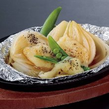 Onions baked in foil