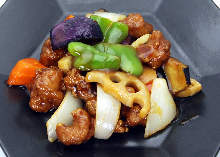 Sweet and sour pork and soybean meat with black vinegar