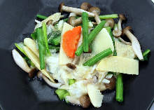 Stir-fried green leaves and yuba (tofu skins)