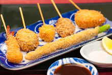 Assorted fried skewers