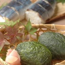 Rice ball wrapped in pickled mustard leaves