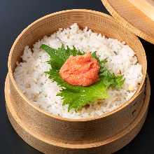 Steamed rice with toppings in wooden steamer