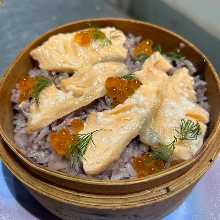 Steamed rice with toppings in wooden steamer