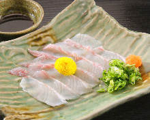 Thinly sliced sea bream sashimi