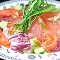 Tomato and raw ham salad