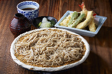 Buckwheat noodles served on a bamboo strainer