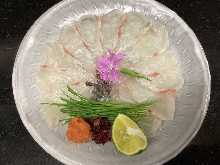 Thinly sliced sea bream sashimi