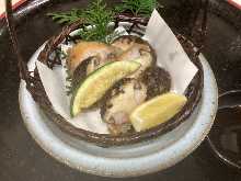 Grilled fresh shiitake mushrooms and shrimp with butter