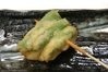 Fried shishito pepper skewer