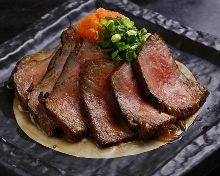 Thinly-sliced rare Wagyu beef steak with grated daikon and ponzu