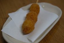 Fried quail egg skewer