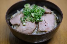 Grilled pork over rice in a lacquered box