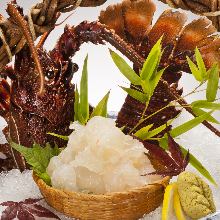 Live spiny lobster sashimi