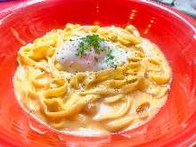 Snow Crab with Tomato Cream Sauce, topped with a Poached Egg