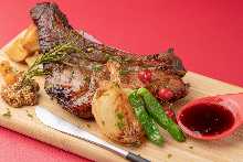 Spiced grilled pork spare ribs with blueberry sauce