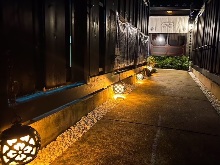 Once you pass through the gate, a cobblestone walkway will heighten your anticipation of entering an extraordinary space.