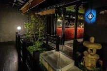 There is a charming courtyard garden and a stone lantern.