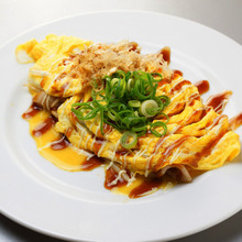 Tonpei-yaki (stir-fried cabbage and meat topped with egg)