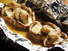 Large shiitake mushroom baked with butter in foil Large shiitake mushroom baked with butter in foil
