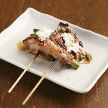 Pork wrapped asparagus skewer