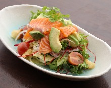 Caesar salad with smoked salmon and avocado