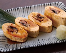 Wrapped omelet with eel