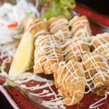 Fried asparagus wrapped with meat