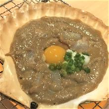 Shellfish adductor muscles dressed in crab tomalley