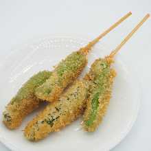 Fried shishito pepper skewer