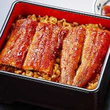 Premium eel served over rice in a lacquered box