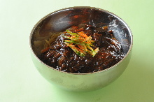 Chinese noodles topped with ground pork