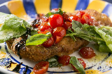 Milanese-style cutlet with arugula
