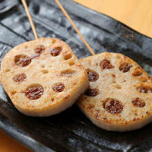 Grilled meat-stuffed lotus root skewer