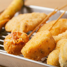 Assorted fried skewers