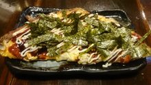 Tonpei-yaki (stir-fried cabbage and meat topped with egg)