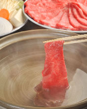 Wagyu beef shabu-shabu served with assorted vegetables Wagyu beef shabu-shabu served with assorted vegetables