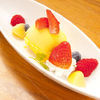 Seasonal ice cream topped with fruits
